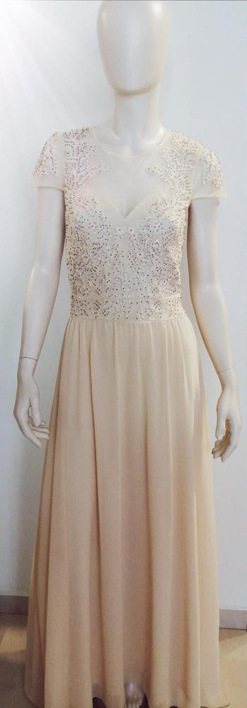 ΦΟΡΕΜΑ  ΕΚΡΟΥ ΜΑΞΙ  ΜΕ ΚΕΝΤΗΜΑ ΣΤΟ ΣΤΗΘΟΣ